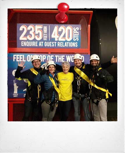 Goodwin Barrett directors climbing the Big One at Blackpool for Children Today